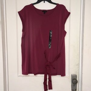 Blush colored top with a side tie